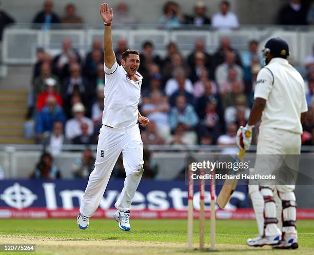 Tim Bresnan of England claims the wicket of Praveen Kumar of India during day one of the 3rd npower Test at Edgbaston on August 10, 2011 in...