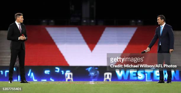 Matthew Richardson and Wayne Carey are seen during the 2020 AFL Round 01 match between the Western Bulldogs and the Collingwood Magpies at Marvel...