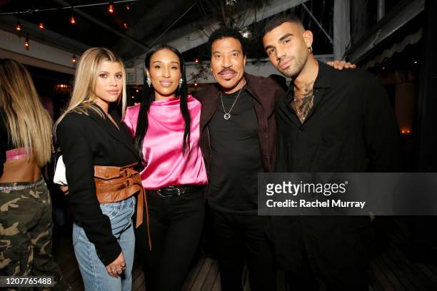 Sofia Richie, Lisa Parigi, Lionel Richie, and Miles Richie attend Rolla's x Sofia Richie Launch Event at Harriet's Rooftop on February 20, 2020 in...