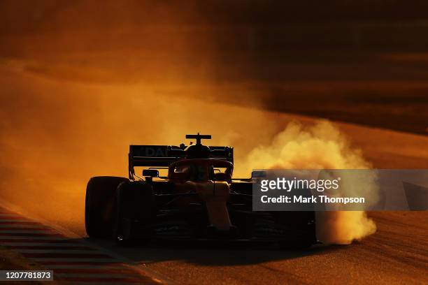 Lando Norris of Great Britain driving the McLaren F1 Team MCL35 Renault locks a wheel under braking during day three of F1 Winter Testing at Circuit...