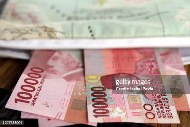 close up of indonesian paper currency - finance and economy stock pictures, royalty-free photos & images