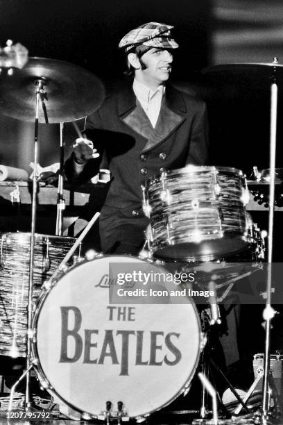 English singer and drummer Ringo Starr of the Beatles performing at Busch Stadium, August 21 in St. Louis, Missouri.