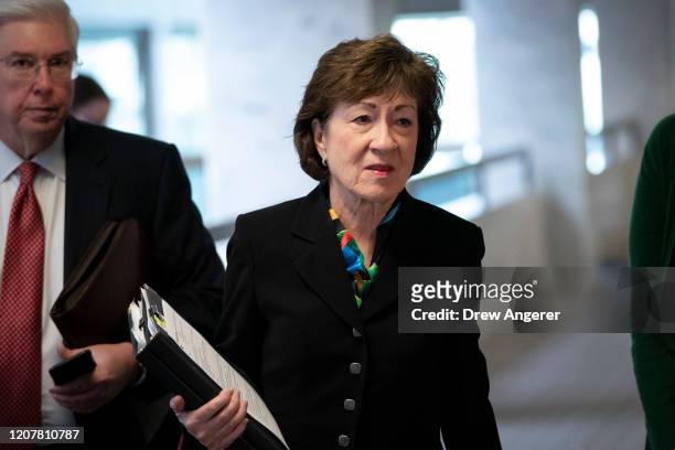 Sen. Susan Collins arrives for a meeting with a select group of Senate Republicans, Senate Democrats, and Trump administration officials in the Hart...