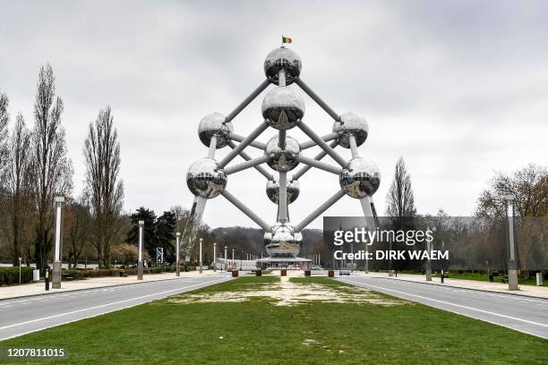 Illustration picture shows a deserted area around the Atomium monument in Brussels, Friday 20 March 2020. From March 18th, new measures are taken to...