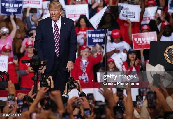 Trump In Crowd President Donald Trump looks toward the crowd at a campaign rally at ...