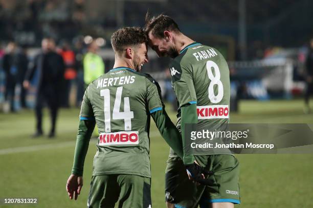 Fabian Ruiz of Napoli celebrates with teammates after scoring to give his side a 2-1 lead during the Serie A match between Brescia Calcio and SSC...