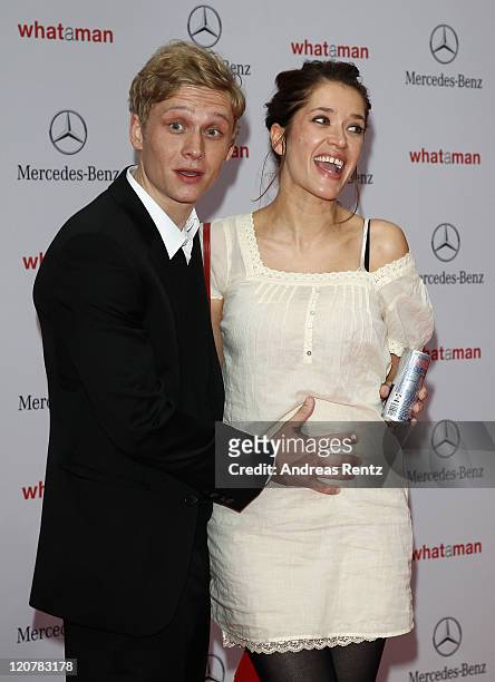 Actor Matthias Schweighoefer and partner Ani Schromm attend the 'What A Man' - Premiere at CineStar on August 10, 2011 in Berlin, Germany.