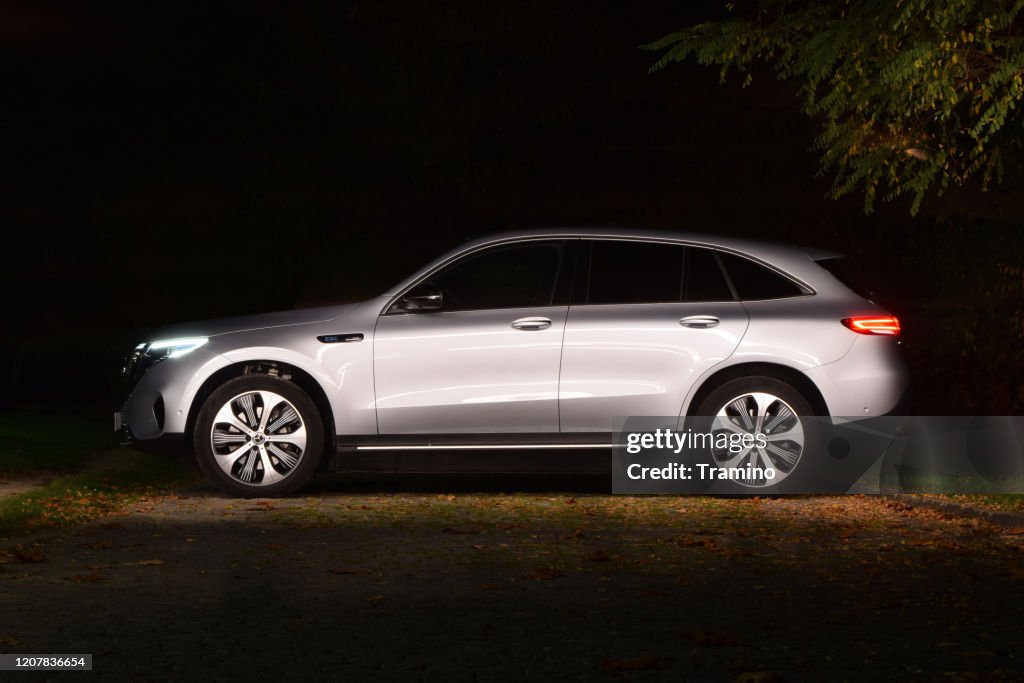 Mercedes-Benz EQC on a street at night