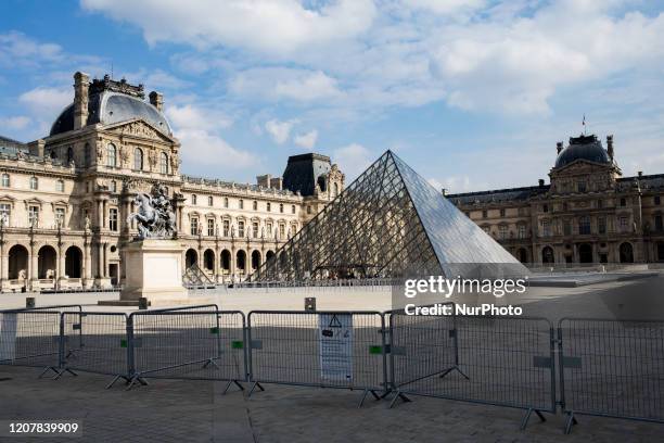 The courtyard of the Louvre usually full of tourists is empty in the context of national containment following the corona virus epidemic in Paris,...