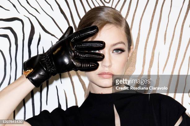Top Model Gigi Hadid is seen backstage at the Versace fashion show on February 21, 2020 in Milan, Italy.