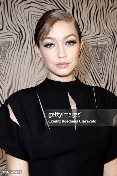 Top Model Gigi Hadid is seen backstage at the Versace fashion show on February 21, 2020 in Milan, Italy.