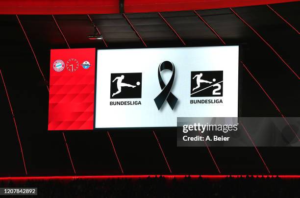 Picture shows the video screen during a minute of silence commemorating the victims of the Hanau terror attack on Wednesday before the Bundesliga...