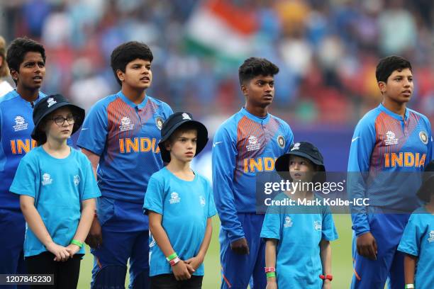 The Indian team sing the national anthem during the ICC Women's T20 Cricket World Cup match between Australia and India at Sydney Showground Stadium...