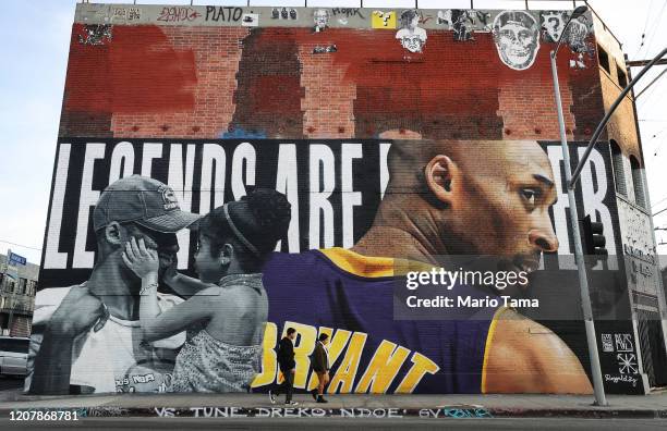 Mural depicting deceased NBA star Kobe Bryant and his 13-year-old daughter Gianna, painted by Royyaldog, is displayed on a building on February 13,...