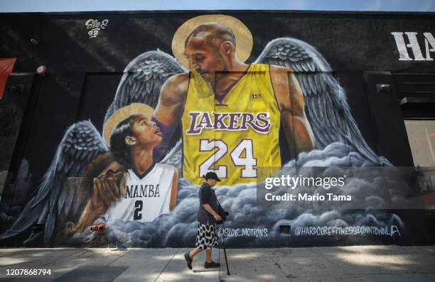 Mural depicting deceased NBA star Kobe Bryant and his daughter Gianna, painted by @sloe_motions, is displayed on a building on February 13, 2020 in...