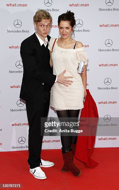 Matthias Schweighoefer and Ani Schromm attend the "What a man" premiere at the Cinestar movie theater on August 10, 2011 in Berlin, Germany.