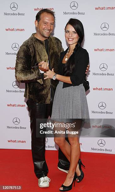 Bjoern Casapietra and Anne-Sophie Wagner attend the "What a man" premiere at the Cinestar movie theater on August 10, 2011 in Berlin, Germany.