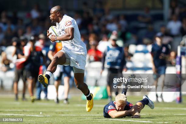 Makazole Mapimpi of the Sharks runs with the ball during the round four Super Rugby match between the Rebels and the Sharks at Mars Stadium on...