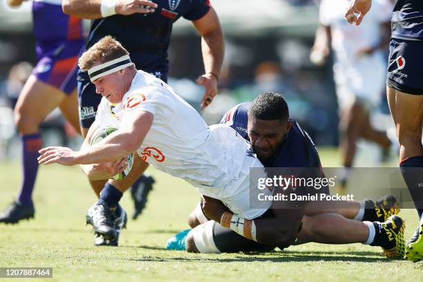 James Venter of the Sharks is tackled during the round four Super Rugby match between the Rebels and the Sharks at Mars Stadium on February 22, 2020...