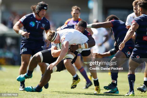 James Venter of the Sharks is tackled during the round four Super Rugby match between the Rebels and the Sharks at Mars Stadium on February 22, 2020...