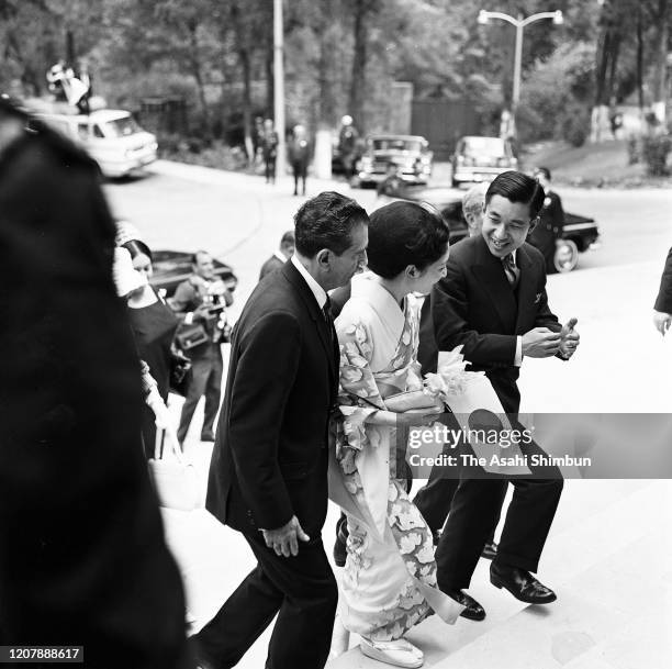 Crown Prince Akihito and Crown Princess Michiko are escorted by Mexican President Adolfo Lopez Mateos on arrival at the Los Pinos on May 11, 1964 in...