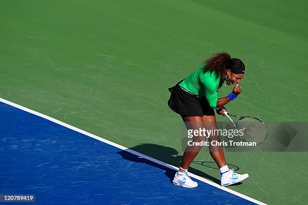 Serena Williams celebrates celebrates winning a point against Julia Goerges of Germany on Day 3 of the Rogers Cup presented by National Bank at the...
