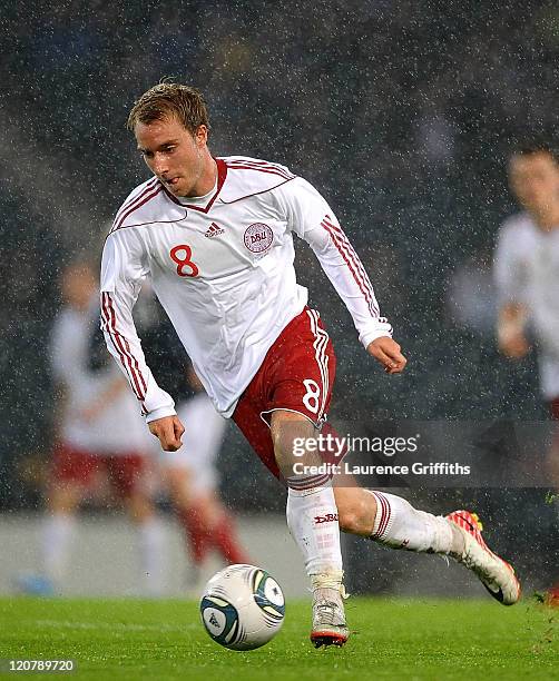 Christian Eriksen of Denmark in action during the International Friendly Match between Scotland and Denmark at Hampden Park on August 10, 2011 in...