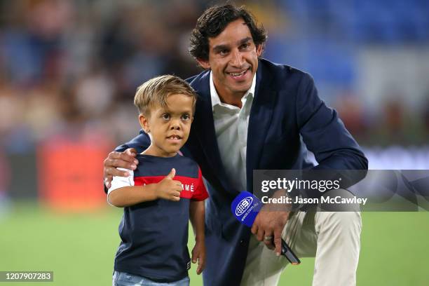 Former rugby league player Johnathan Thurston poses with Quaden Bayles before the NRL match between the Indigenous All-Stars and the New Zealand...