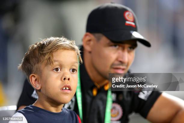 Quaden Bayles looks on with Cody Walker of the Indigenous All-Stars before the NRL match between the Indigenous All-Stars and the New Zealand Maori...