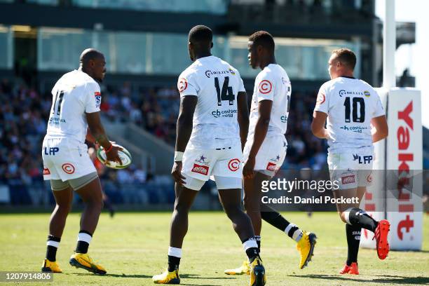 Makazole Mapimpi of the Sharks passes the ball to Curwin Bosch of the Sharks in for an unmanned try during the round four Super Rugby match between...