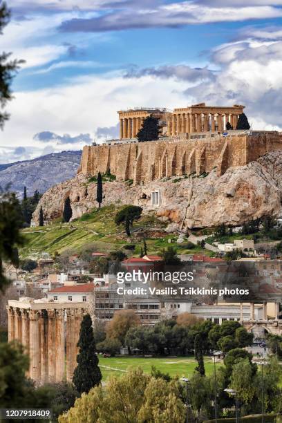 the athens acropolis and the temple of the olympian zeus - athens acropolis stockfoto's en -beelden