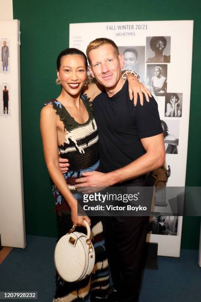 Molly Chang and designer Paul Andrew attend the Salvatore Ferragamo show during during Milan Fashion Week Fall/Winter 2020/2021 on February 22, 2020...