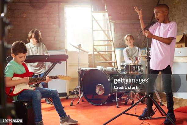 garage tunes - rock group stock pictures, royalty-free photos & images