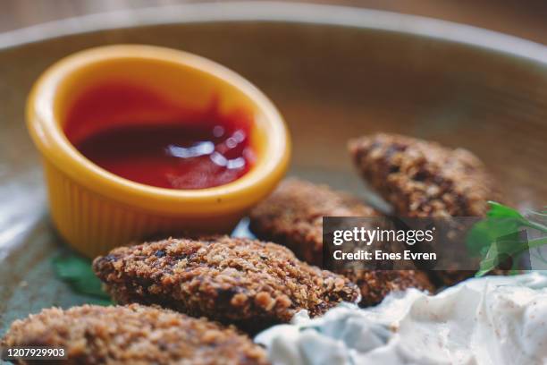 falafel, a classic middle eastern appetizers with sauce - turkey meat balls stock pictures, royalty-free photos & images