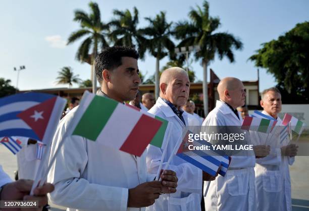 Doctors and nurses of Cuba's Henry Reeve International Medical Brigade are bid farewell before they travel to hard-hit Italy to help in the fight...