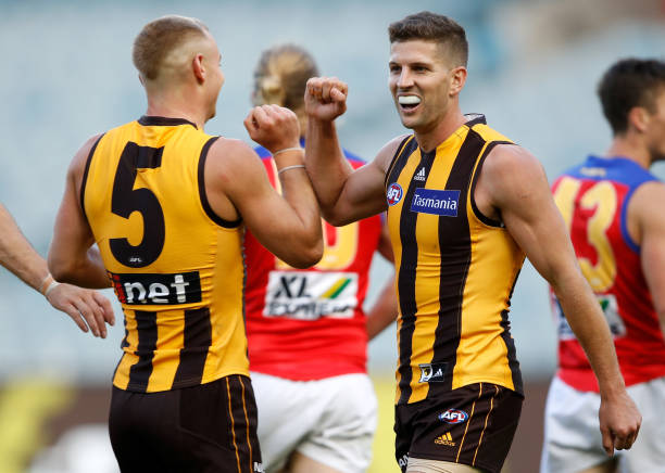 Luke Breust of the Hawks celebrates a goal with James Worpel of the Hawks during the 2020 AFL Round 01 match between the Hawthorn Hawks and the...