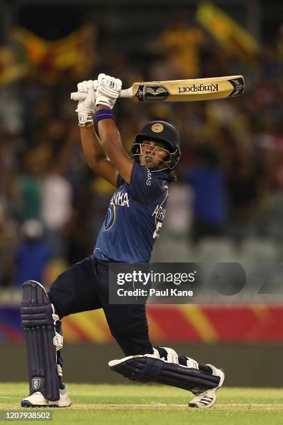 Chamari Athapaththu of Sri Lanka hits a six during the ICC Women's T20 Cricket World Cup match between New Zealand and Sri Lanka at the WACA on...