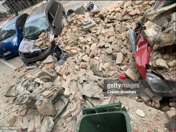 Debris damaged parked cars after spread from buildings following a 5.3 earthquake on March 22, 2020 in Zagreb, Croatia. A magnitude 5.3 earthquake...