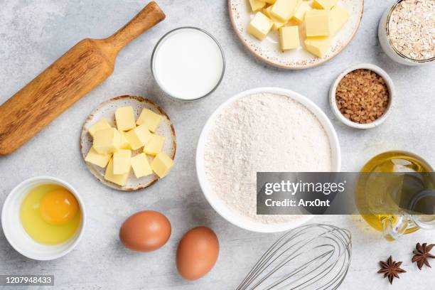 ingredients for baking on concrete background - milk and cookies stock pictures, royalty-free photos & images