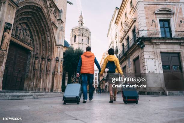 couple visiting spain - winter town stock pictures, royalty-free photos & images