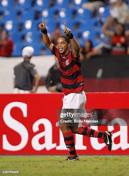 Ronaldinho of Flamengo celebrates scored goal againist during a match as part of Copa Bridgestone Sudamericana 2011 at Engenhao stadium on August 10,...