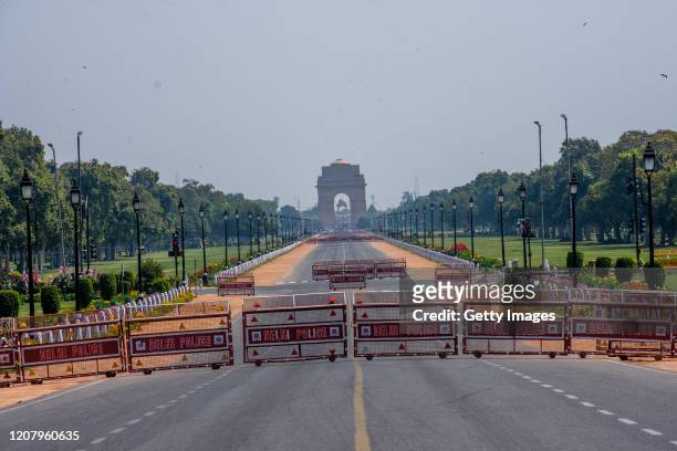 Deserted view of historic India Gate, during a one-day nationwide Janata curfew imposed as a preventive measure against the COVID-19 on March 22,...