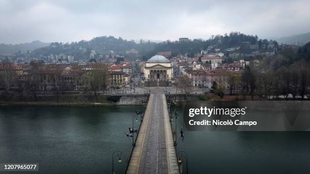 General view shows almost deserted bridge Vittorio Emanuele I and church of Gran Madre di Dio. The Italian government imposed unprecedented...