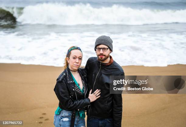 Evelyn Lebel and her fiancé Chris Stepanek pose for a portrait on the beach near her parent's house on Plum Island in Newbury, MA on March 20, 2020....