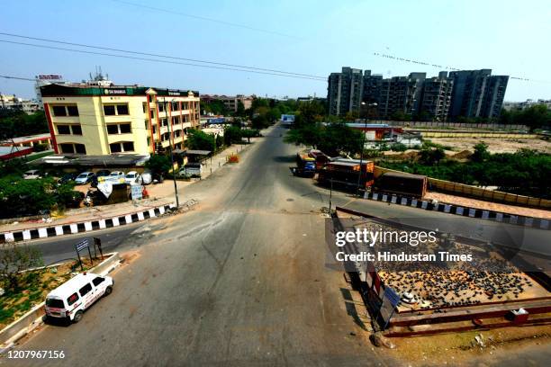 Empty stretch of road at Geeta Colony area, on March 22, 2020 in New Delhi, India. PM Modi proposed a 'Janata curfew' for the day between 7 am and 9...