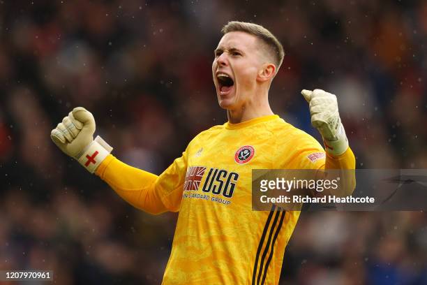 Dean Henderson of Sheffield United celebrates his sides first goal during the Premier League match between Sheffield United and Brighton & Hove...