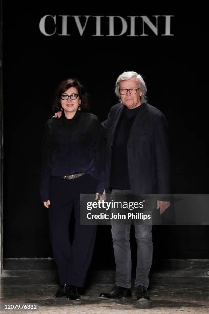 Fashion designers Miriam Cividini and Piero Cividini acknowledge the applause of the public after the Cividini fashion show as part of Milan Fashion...