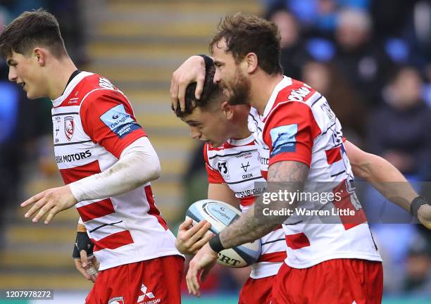 Charlie Chapman of Gloucester is congratulated by team mate Danny Cipriani after scoring a try during the Gallagher Premiership Rugby match between...