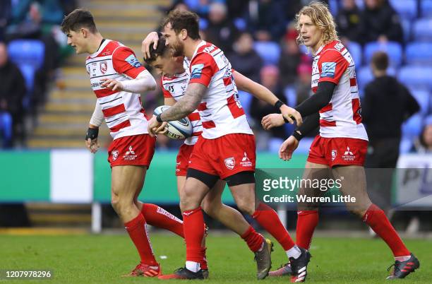 Charlie Chapman of Gloucester is congratulated by team mate Danny Cipriani after scoring a try during the Gallagher Premiership Rugby match between...