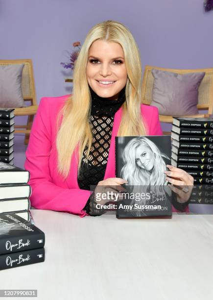 Jessica Simpson poses with her book during Create & Cultivate Los Angeles at Rolling Greens Los Angeles on February 22, 2020 in Los Angeles,...